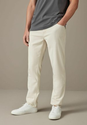 SUMMERWEIGHT COTTON - Jeans Tapered Fit - ecru white