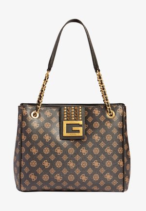 Sac à main de créateur noir et marron avec imprimé logo à motifs, anses en chaîne dorée et un emblème central doré en forme de « G » avec des clous décoratifs.