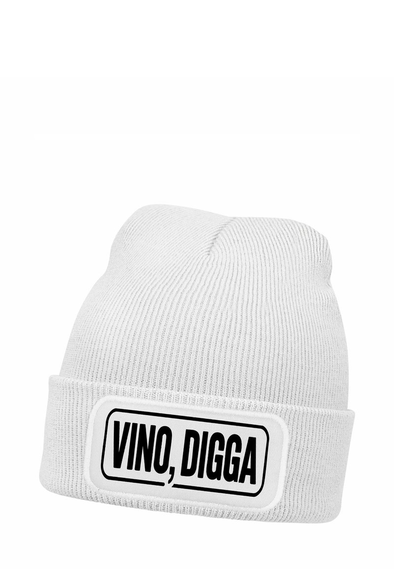 White knit beanie with a folded cuff featuring a rectangular patch that reads "VINO, DIGGA" in bold black letters.