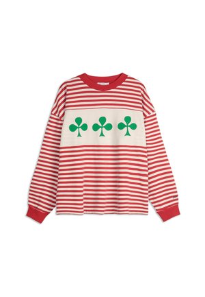 Long-sleeve striped shirt with red and white stripes, featuring a cream panel with three green clover icons. Ribbed neckline and cuffs.
