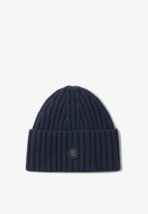 Navy blue ribbed knit beanie with folded cuff and black circular patch featuring a raised letter "B" on the front center.