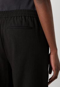 BOSS TILDINA - Tygbyxor - black