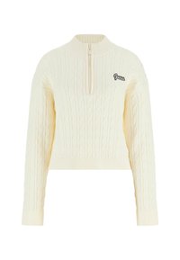 Maglione accorciato di colore crema con motivo a trecce, colletto alto e zip a quarto. Presenta un piccolo logo nero "Guess" sul petto.