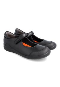 Zapatos Mary Jane negros de cuero, con una correa de Velcro, punta redondeada y una plantilla naranja con un exterior texturizado y suela de goma.