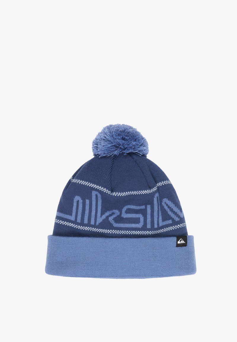 Bonnet d'hiver en maille bleu avec bordure bleu clair et pompon, présentant un motif stylisé du nom de la marque au centre.