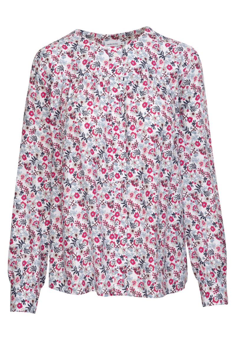 Langemouwige bloes met bloemenprint op een witte achtergrond met roze en marineblauwe bloemen, een ronde halslijn en een losse pasvorm met geplooide details.