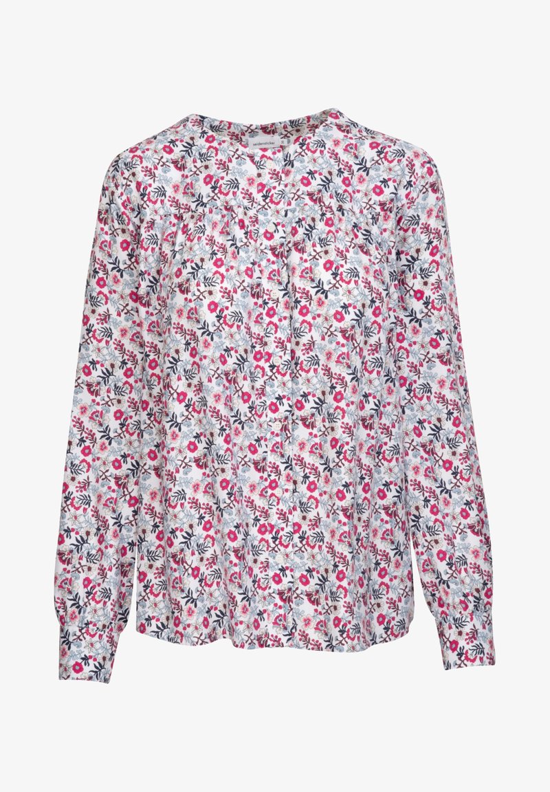 Langemouwige bloes met bloemenprint op een witte achtergrond met roze en marineblauwe bloemen, een ronde halslijn en een losse pasvorm met geplooide details.