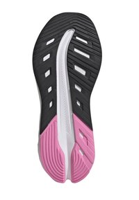 Suela de zapato con un diseño en blanco y negro con acentos en rosa. El caucho texturizado ofrece agarre, con cortes para flexibilidad y transpirabilidad.