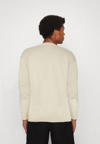 Jack & Jones PREMIUM JPRBLUPETE CREW NECK - Bluză de molton - island fossil