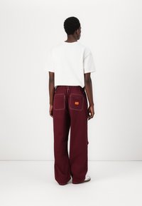 Brixton GLOBAL BAGGY PANT - Relaxed fit jeans - port