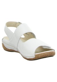 White leather sandal with open toe and ankle straps. Textured cork sole and stitched detailing provide a contrasting finish.