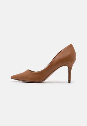 Brown leather pointed-toe women's high heel shoe with slender heel, shown in side profile on a plain light background.