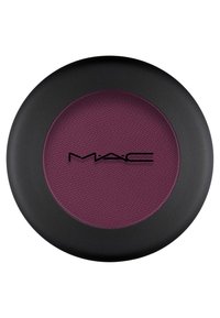 MAC:n poskipun Compact, jossa on pyöreä muoto, matta musta ulkopinta ja teksturoitu violetti poskipuna keskellä, sekä selvästi esillä oleva "MAC" -logo.