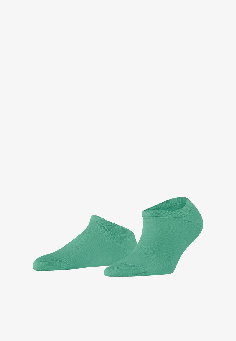 Grüne Knöchelsocken aus einem glatten Strickmaterial, mit einem niedrigen Schnitt und einer nahtlosen Zehenpartie für besonderen Komfort.