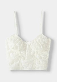 Bílá krajková podprsenka s květinovým vzorem, strukturované košíčky, nastavitelné ramínka a malá mašle ve středu. Jemná textura a přiléhavý design.
