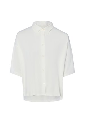 Biała bluzka z krótkim rękawem na guziki, z ostrym kołnierzem i lekko luźnym krojem.