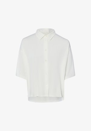Biała bluzka z krótkim rękawem na guziki, z ostrym kołnierzem i lekko luźnym krojem.