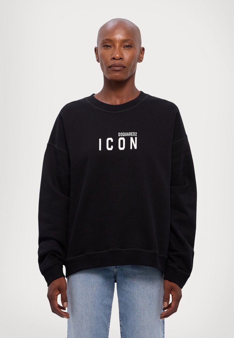 Čierna mikina vyrobená z bavlny, s okrúhlym výstrihom a dlhými rukávmi. Na prednej strane je vytlačené logo "DSQUARED2 ICON" v bielej farbe.