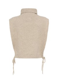 Beige, cropped knit sweater with a high collar, side ties, and ribbed hem. Soft texture with minimal seams, designed for layering.