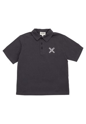 Polo noir à manches courtes avec col, trois boutons et logo blanc Kenzo Kids sur la poitrine gauche.