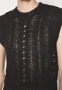 Han Kjøbenhavn Pullover - black