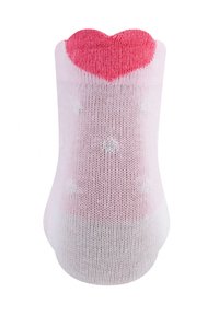 Rosa gestrickte Socke mit einem herzförmigen Bündchen in dunklerem Rosa, versehen mit weißen Punkten auf dem Hauptkörper und einer glatten Textur.