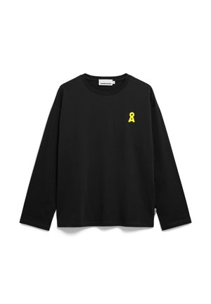 Black long-sleeve shirt with crew neck, small yellow logo on left chest, and brand label inside collar and near hem on white background.
