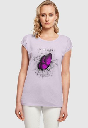 Lilac cotton t-shirt with rolled sleeves, featuring a purple butterfly graphic and text design on the front. Smooth texture, casual fit.