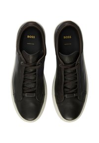 Dark brown leather sneakers with textured accents, flat laces, and a white rubber sole. Features "BOSS" branding on the insole.