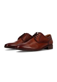 Chaussures habillées en cuir marron avec une finition lisse, à lacets et panneaux latéraux texturés. Elles présentent un petit talon et un bout arrondi.
