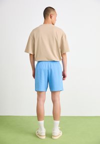 adidas Originals Tracksuit bottoms - light blue