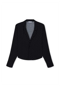 Blusa nera a maniche lunghe con scollo a V e pois bianchi. Tessuto morbido, silhouette leggermente cropped e chiusura con bottoni davanti.