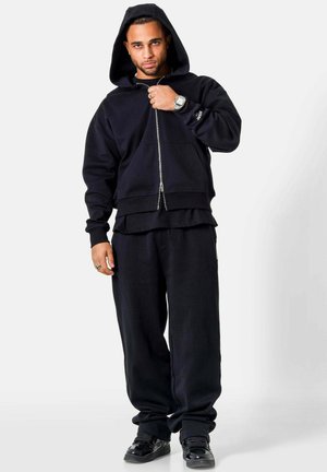 HEAVY - Pantalon de survêtement - black