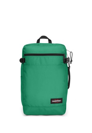 Sac à dos Eastpak rectangulaire vert avec une poche avant zippée, une poignée supérieure et une sangle latérale réglable.