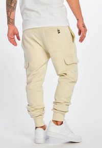 Just Rhyse HUARAZ - Spodnji deli trenirk - beige