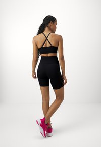 Puma SEAMLESS SHORT  - Tights - black vapor cat