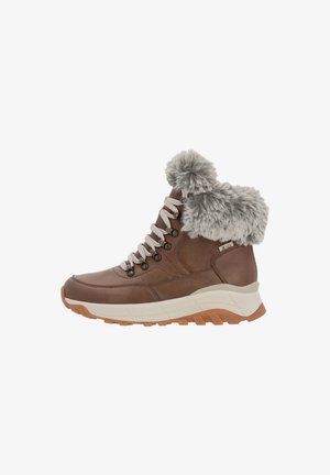Bottines en cuir marron avec bord en fausse fourrure grise, lacets beige et semelle épaisse blanche avec traction en caoutchouc. Équipées d'œillets métalliques.