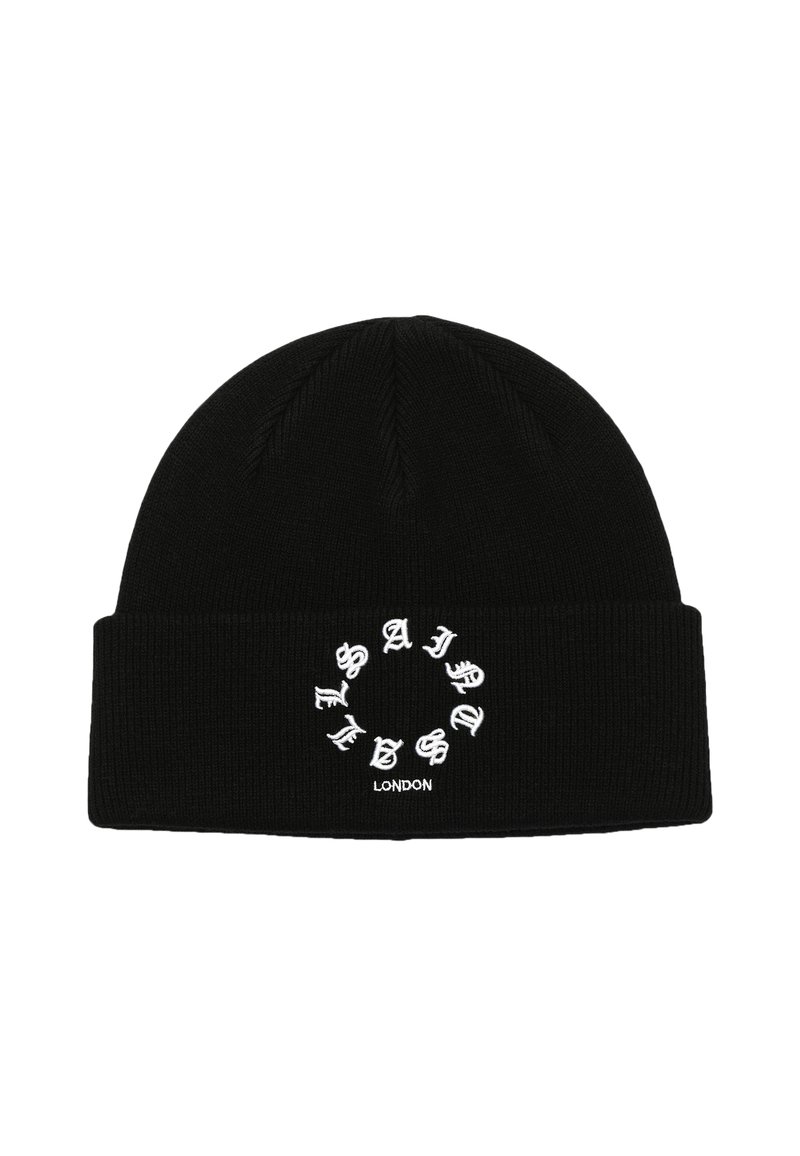 Beanie negro de punto con textura acanalada y un gráfico circular con la palabra "Saint" en letras blancas, ubicado en la parte frontal.