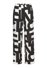Black and white wide-leg pants featuring a bold graphic letter pattern, elastic waistband, and smooth fabric texture.