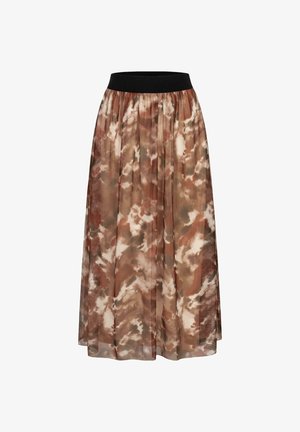 Plissierter Rock mit einem breiten schwarzen Gummibund, aus einem fließenden, translucent Stoff in einem braunen und cremefarbenen, abstrakten Batikmuster.