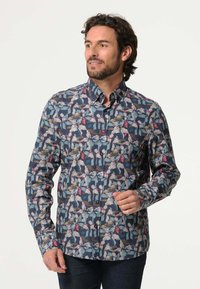 Overhemd met een donker marineblauwe achtergrond, voorzien van een bloemenpatroon in pastelkleuren, lange mouwen en een klassieke kraag.