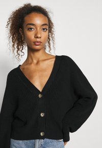 Monki Casaco de malha - black