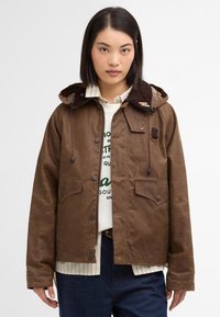 Brown waxed jacket with a corduroy collar, snap buttons, two chest pockets, and adjustable hood, layered over a striped shirt.