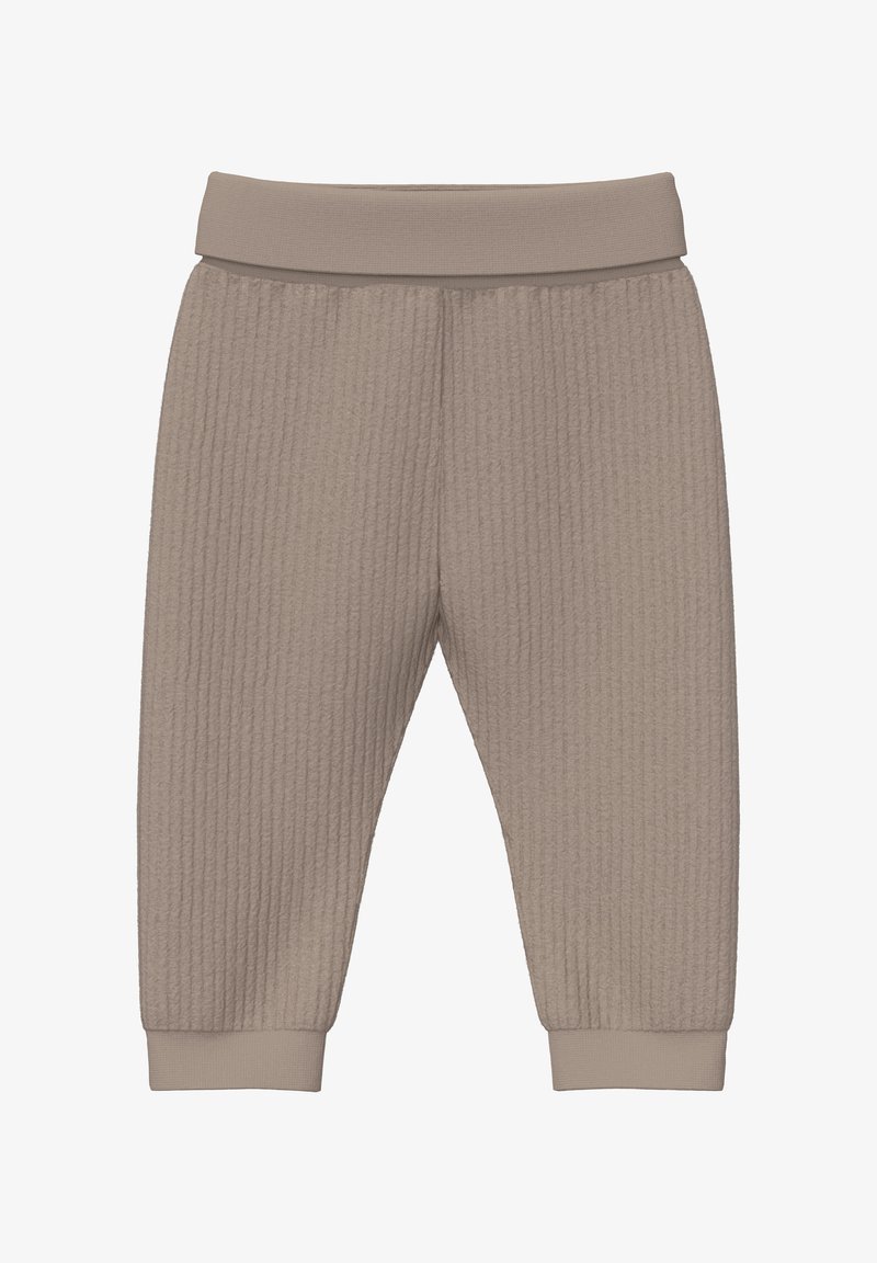 Miękkie beżowe spodnie dla niemowląt z prążkowaną fakturą, elastycznym pasem i ściągaczami przy kostkach, zaprojektowane z myślą o komforcie i ciepłym otoczeniu.