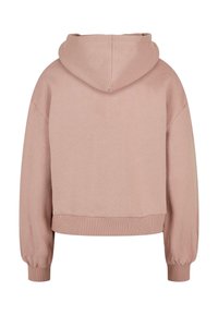Korte hoodie in zachtroze. Heeft een capuchon, verlaagde schouders en ribgebreide manchetten. Gemaakt van textuur katoenmixstof.