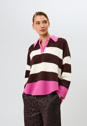 Striped sweater in brown, cream, and pink hues; features a collar and buttons, made from a soft material with a relaxed fit.