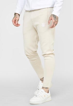 Pantalones deportivos - beige