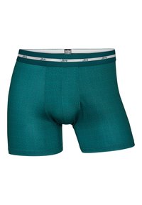 Teal boxer briefs with a geometric pattern, elastic waistband featuring silver brand logo, smooth texture, and fitted design.