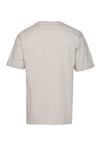 Lysbeige bomulds t-shirt, korte ærmer, rund halsudskæring, afslappet pasform, glat tekstur, ingen synlige mønstre eller grafikker.
