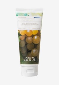 Lichaamssmoothiemelk in een witte knijptube, met een groen en druivenpatroon op het etiket. Inhoud: 200 mL, 6,76 FL. OZ.